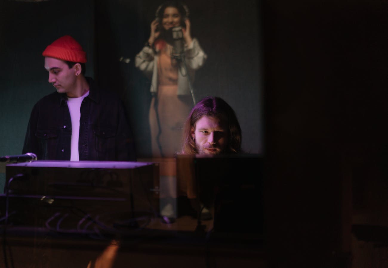 Engineers working at music studio